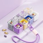 Black 8-Grid Magic Cube Pill Box with Lanyard - Portable Weekly Sealed Tablet Organizer & Dispenser - Image 2
